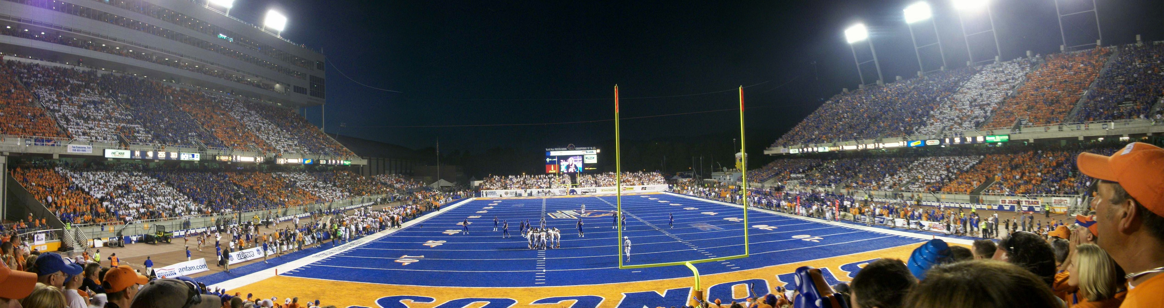 A packed stadium under the lights